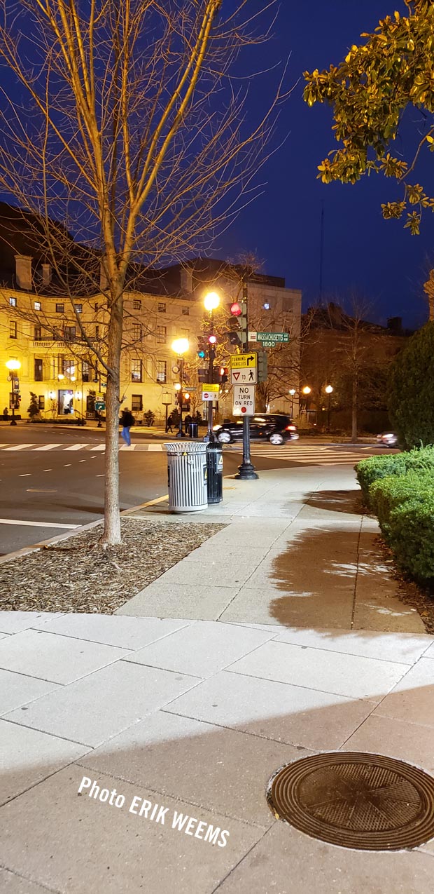 At Dupont Circle next to Massachusetts Ave at night